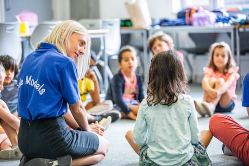 Children sitting in a circle.